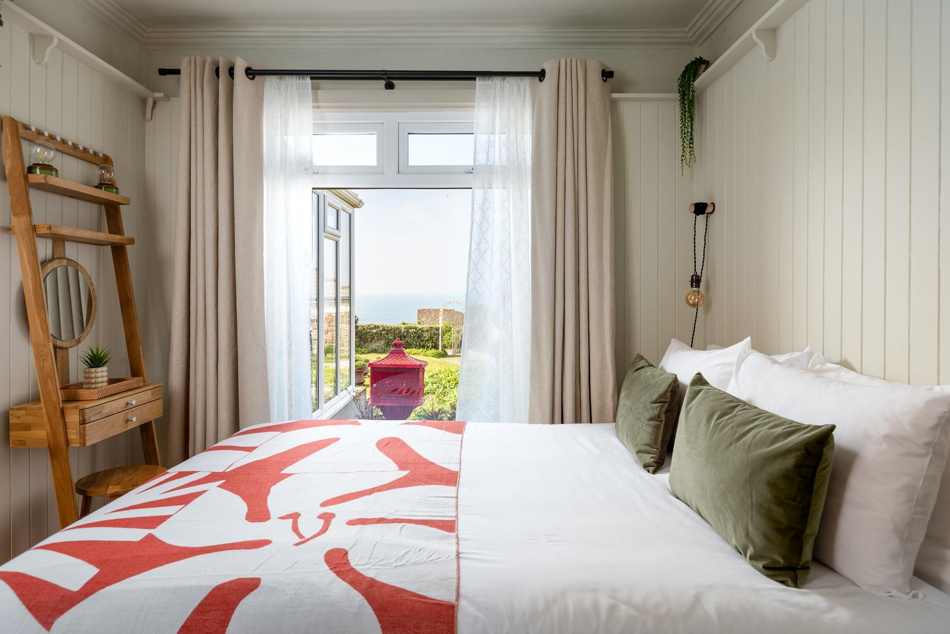 Bedroom 1 is on the ground floor and features modern and stylish furnishings.