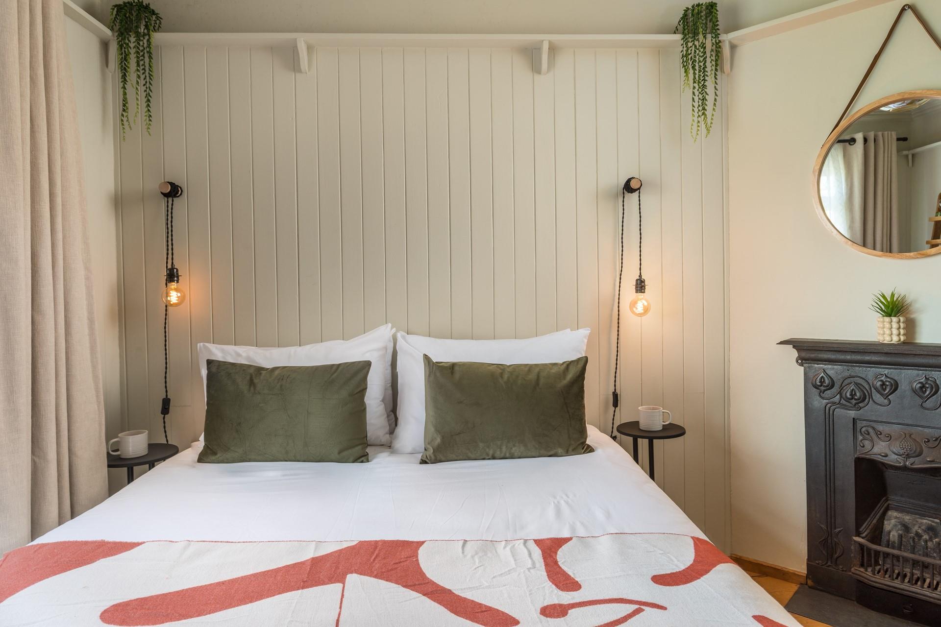 Relaxing, earthy tones feature in bedroom 1.