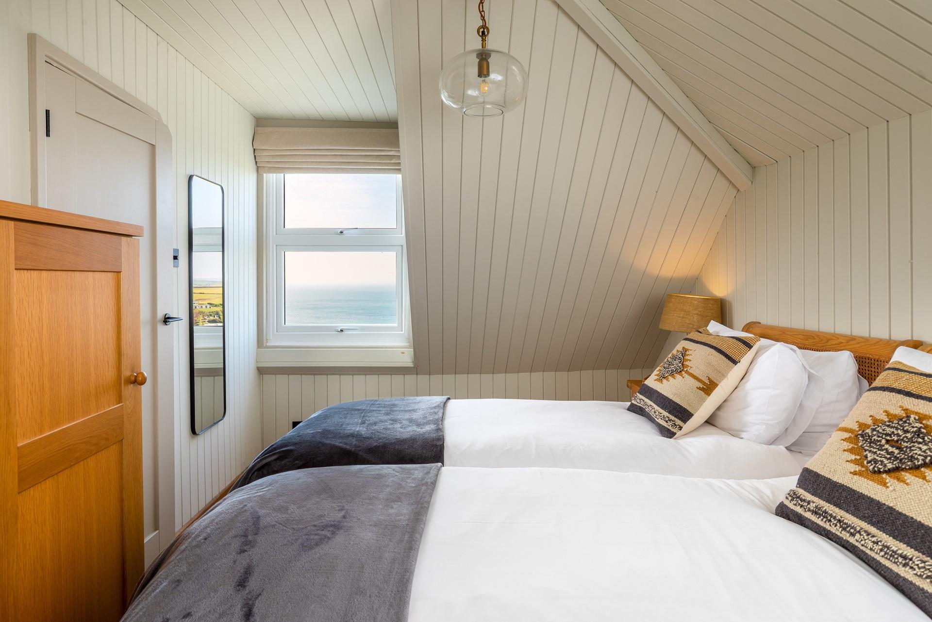 Unwind in the twin beds after a busy day of exploring.