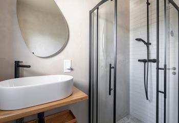 The downstairs shower room is modern and stylish.