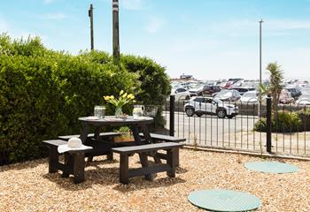 Make the most of warm evenings with dinner outdoors.