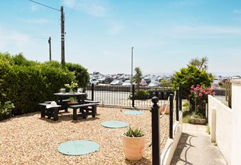 Pour yourself a chilled glass of wine and soak up the evening sunshine in front of the ocean. 