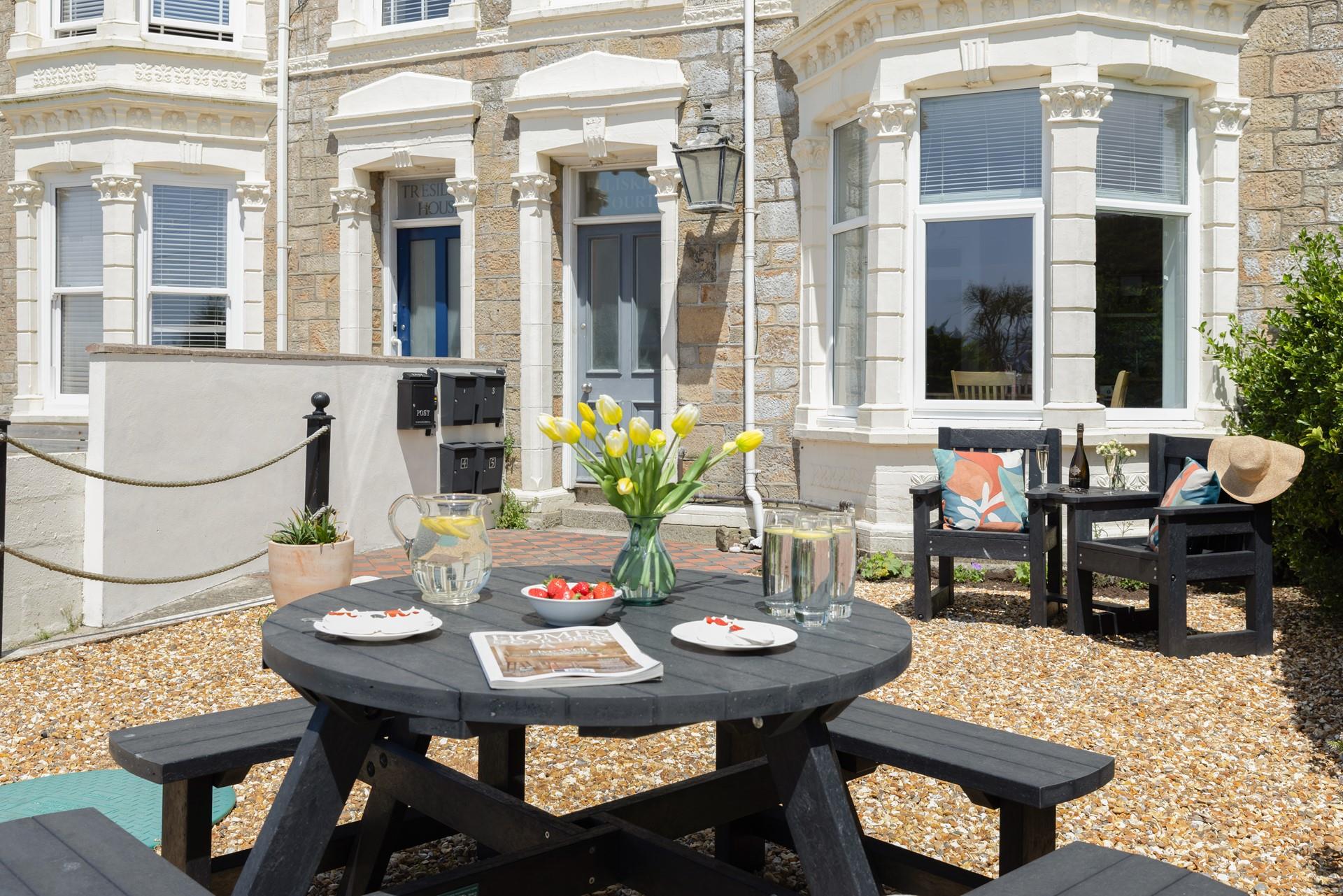 Enjoy breakfast outside before wandering into Marazion.