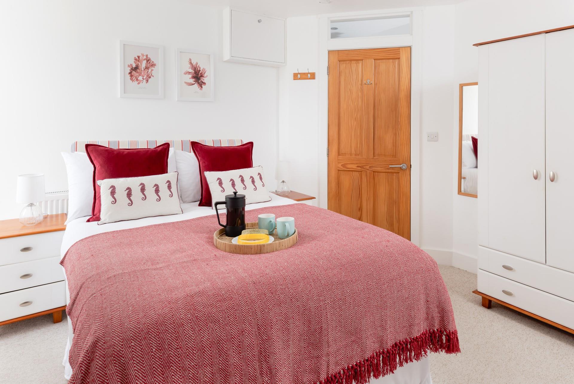 Climb into bed after a day filled with sea air and sunshine.