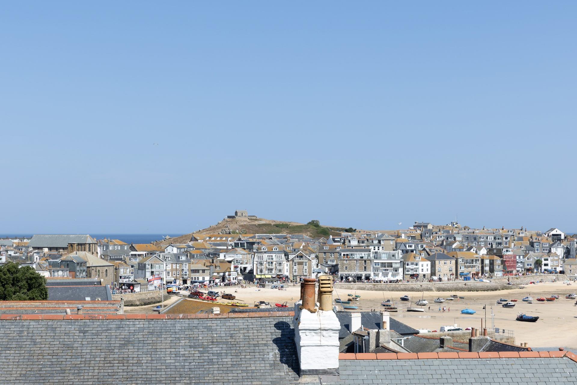 Take in the picturesque view across the rooftops and out to sea!