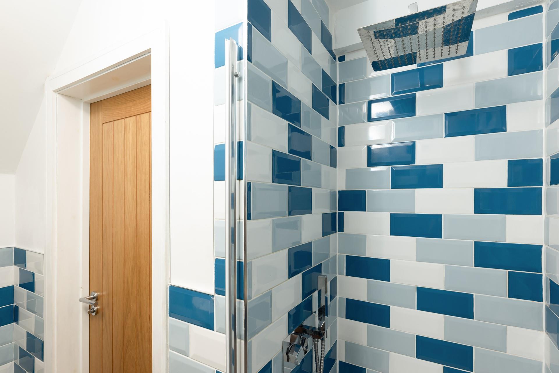 A luxurious rainfall shower offers a refreshing start to the day!