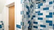 A luxurious rainfall shower offers a refreshing start to the day!