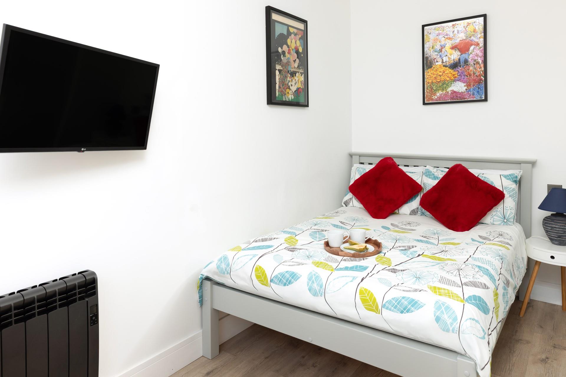 Bedroom 1 is a charming haven where you'll sleep well after days spent in the salty sea air.