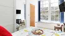 Colourful decor creates a cosy home-from-home.