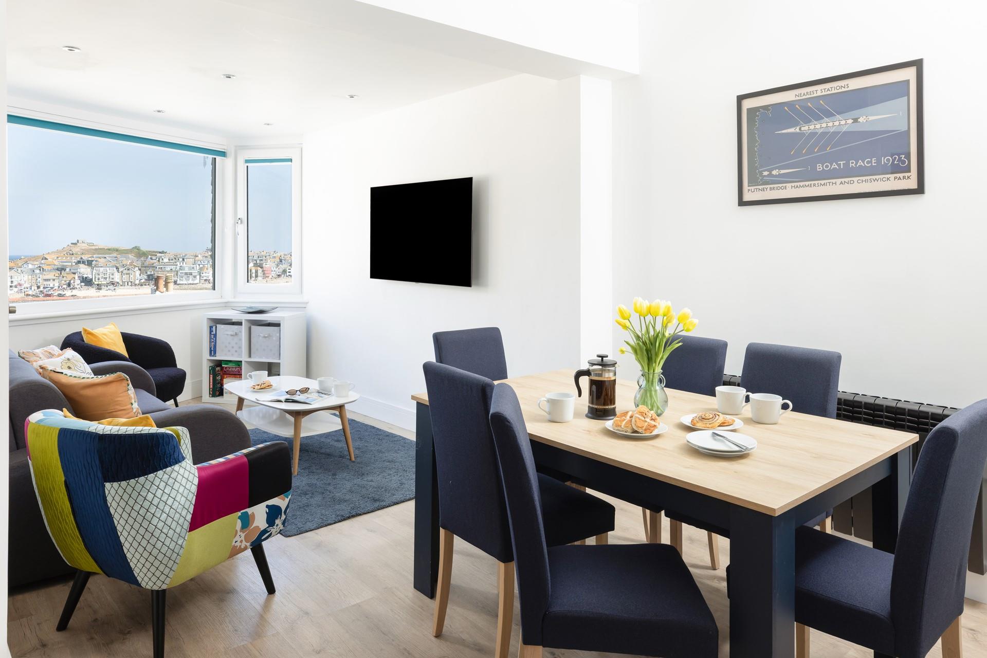 Enjoy the view from the comfort of the sofa or the dining table.