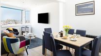 Enjoy the view from the comfort of the sofa or the dining table.