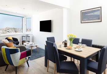Enjoy the view from the comfort of the sofa or the dining table.