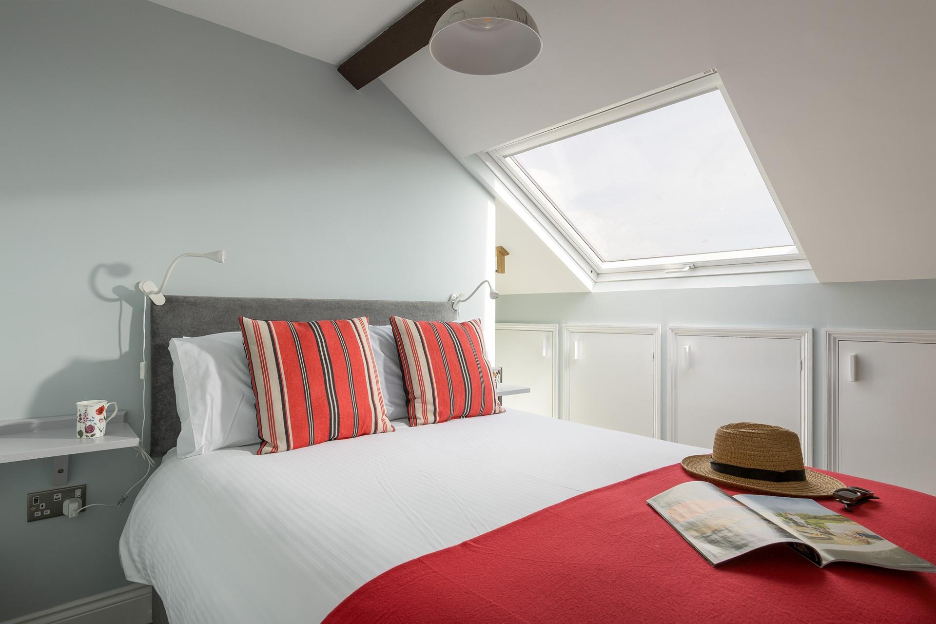 Sink into bed and unwind in the cosy bedroom. 