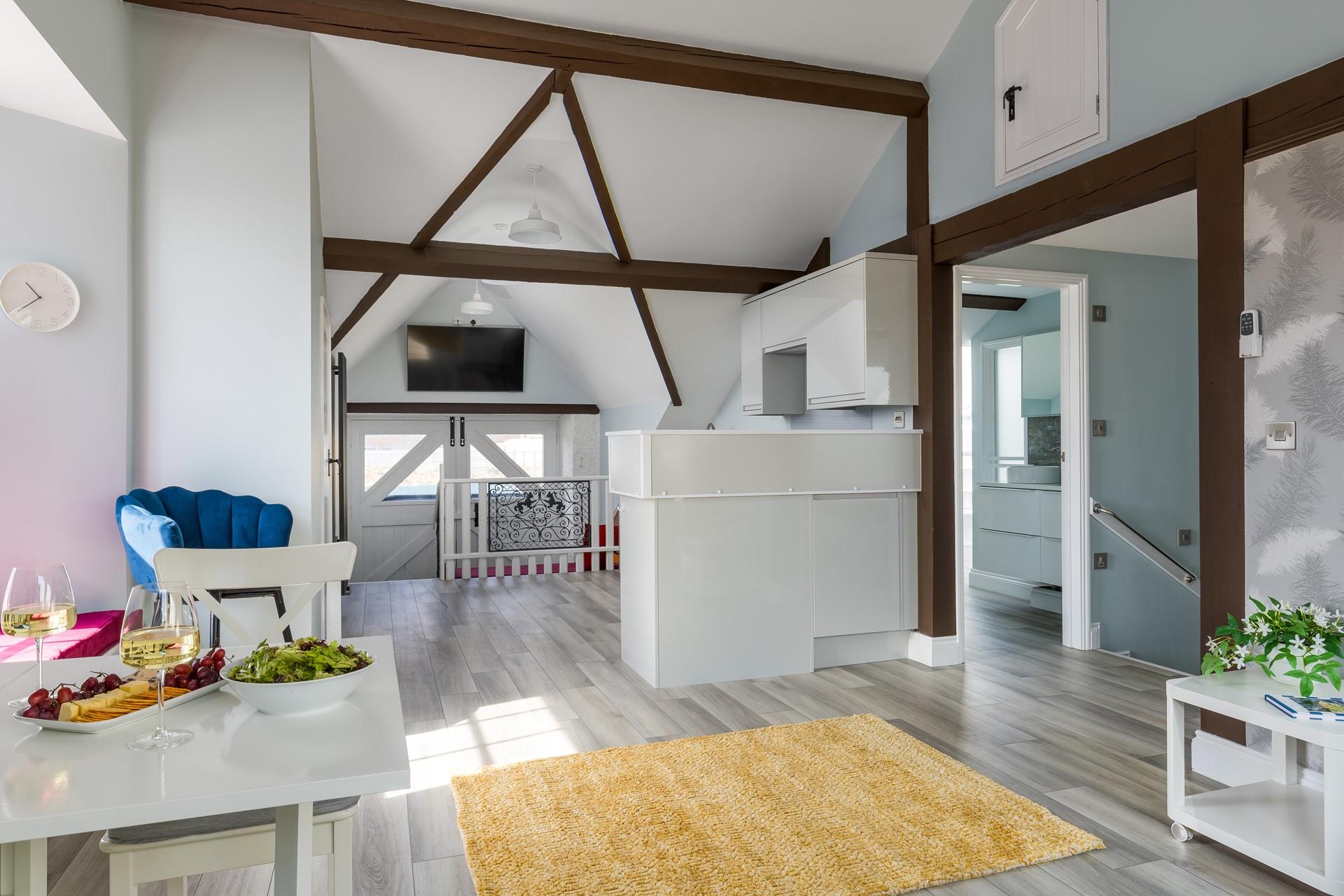 The open-plan living area is bright and spacious.