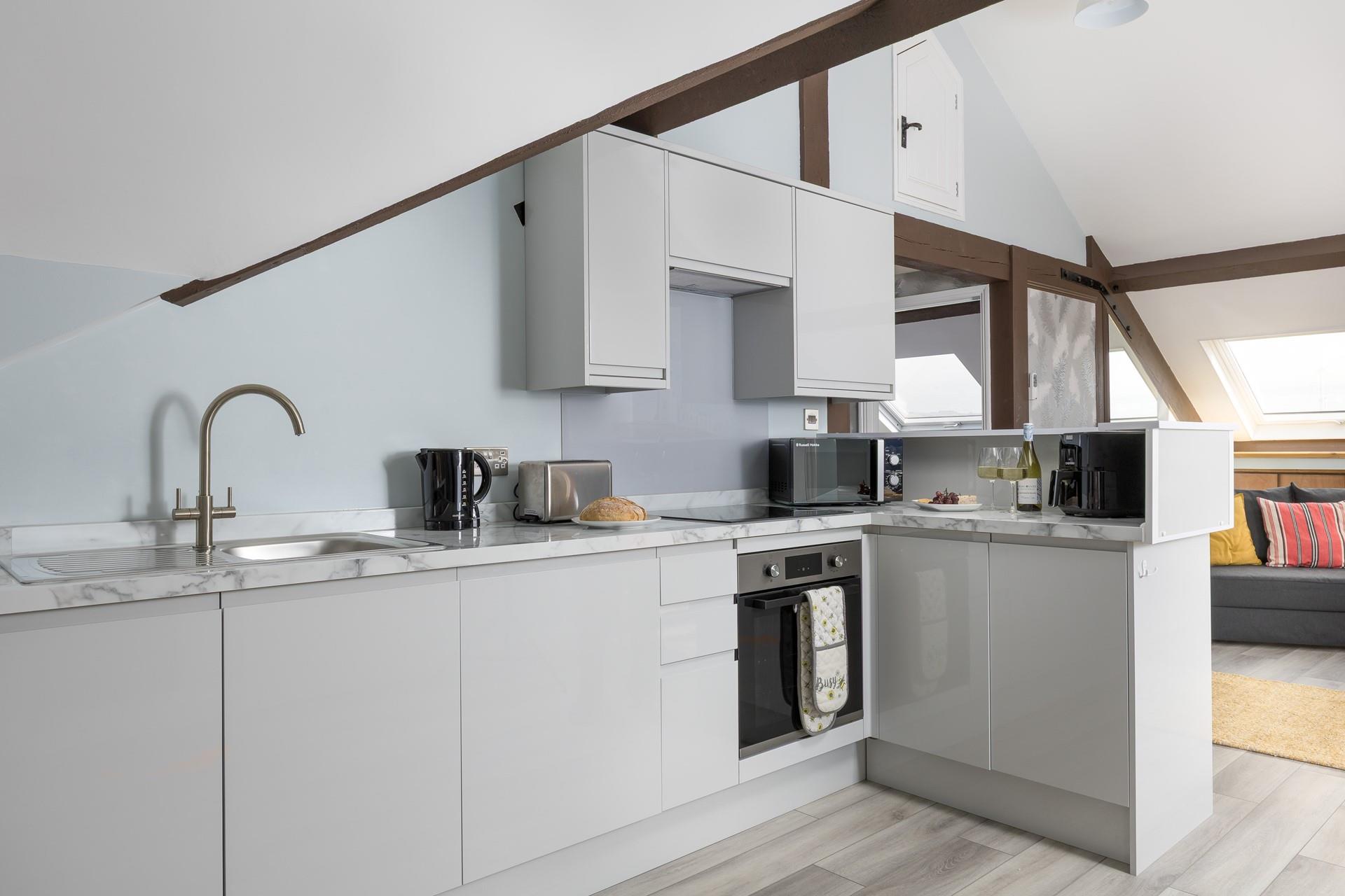 Rustle up a delicious home-cooked meal in the modern kitchen.