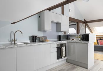 Rustle up a delicious home-cooked meal in the modern kitchen.