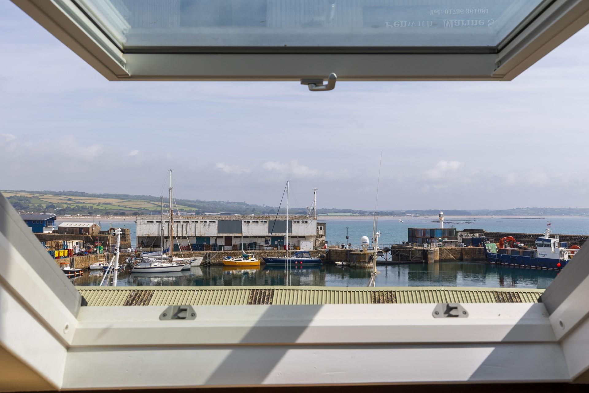 Watch the tide ebb and flow from the window.