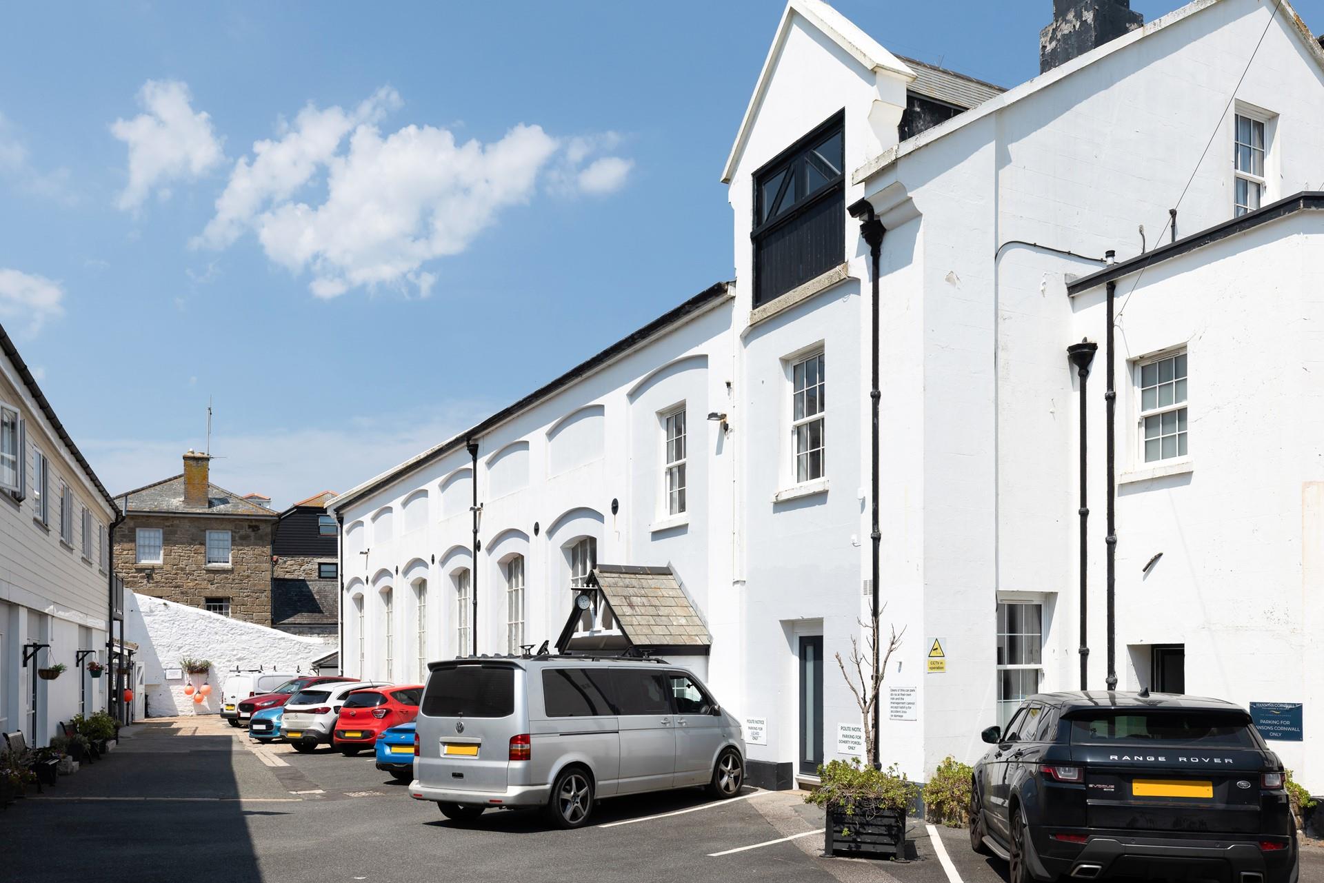 The modern apartment is a short walk from Penzance waterfront, shops and eateries.