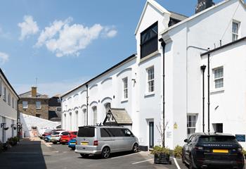 The modern apartment is a short walk from Penzance waterfront, shops and eateries.