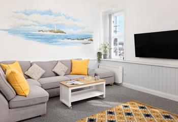 The cosy living area overlooks the harbour in Penzance.