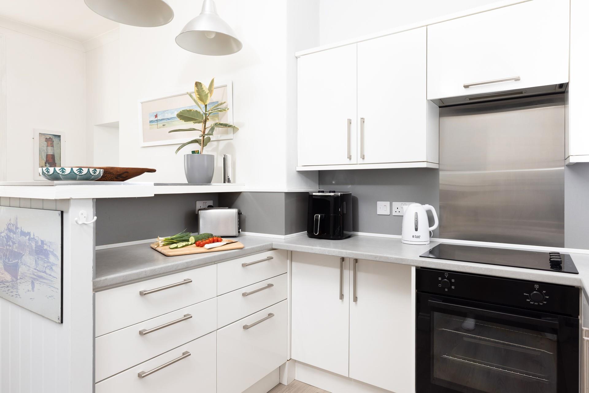 The kitchen is compact and well equipped.