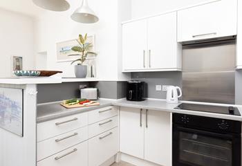 The kitchen is compact and well equipped.