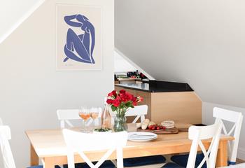 Spend your days on the beach and evenings gathered around the dining table.