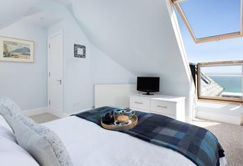 Wake up to the sights and sounds of the sea in bedroom 1. 