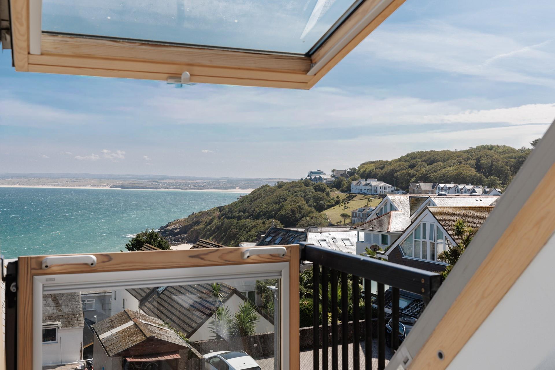 Far-reaching views look out across the golden sands of Hayle's vast beach. 