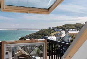 Far-reaching views look out across the golden sands of Hayle's vast beach. 