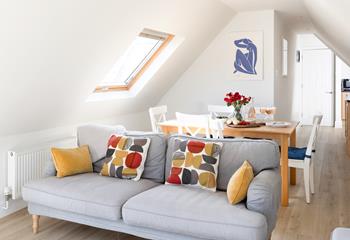 Light and airy with pops of colour throughout. 