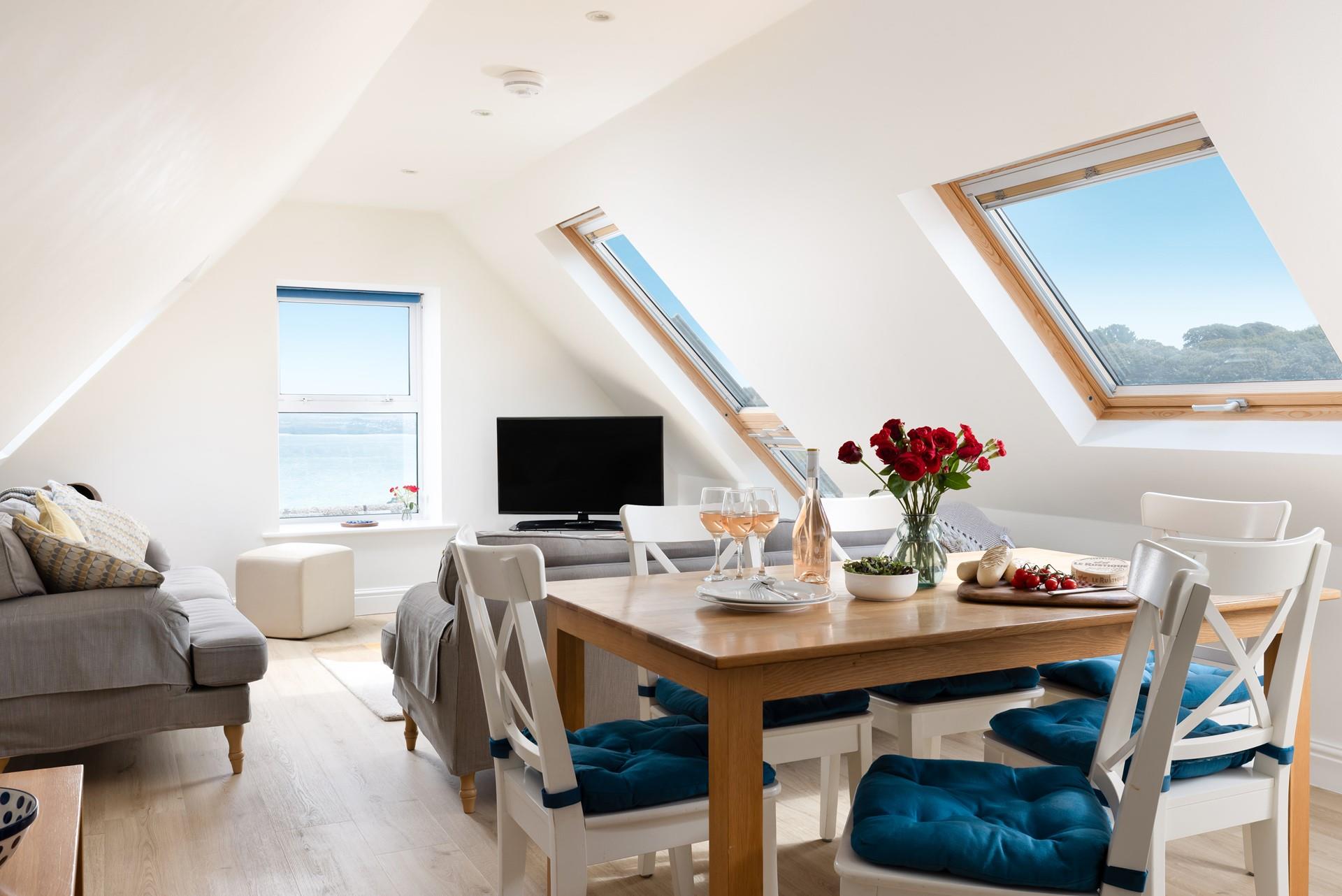 Open plan living and dining makes the most of the view.