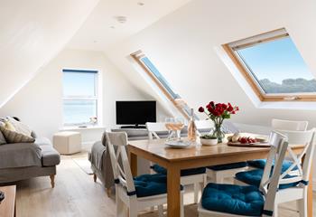 Open plan living and dining makes the most of the view.