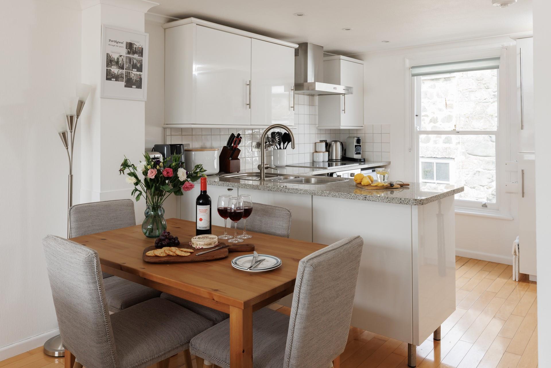 Enjoy a delicious meal around the dining table. 
