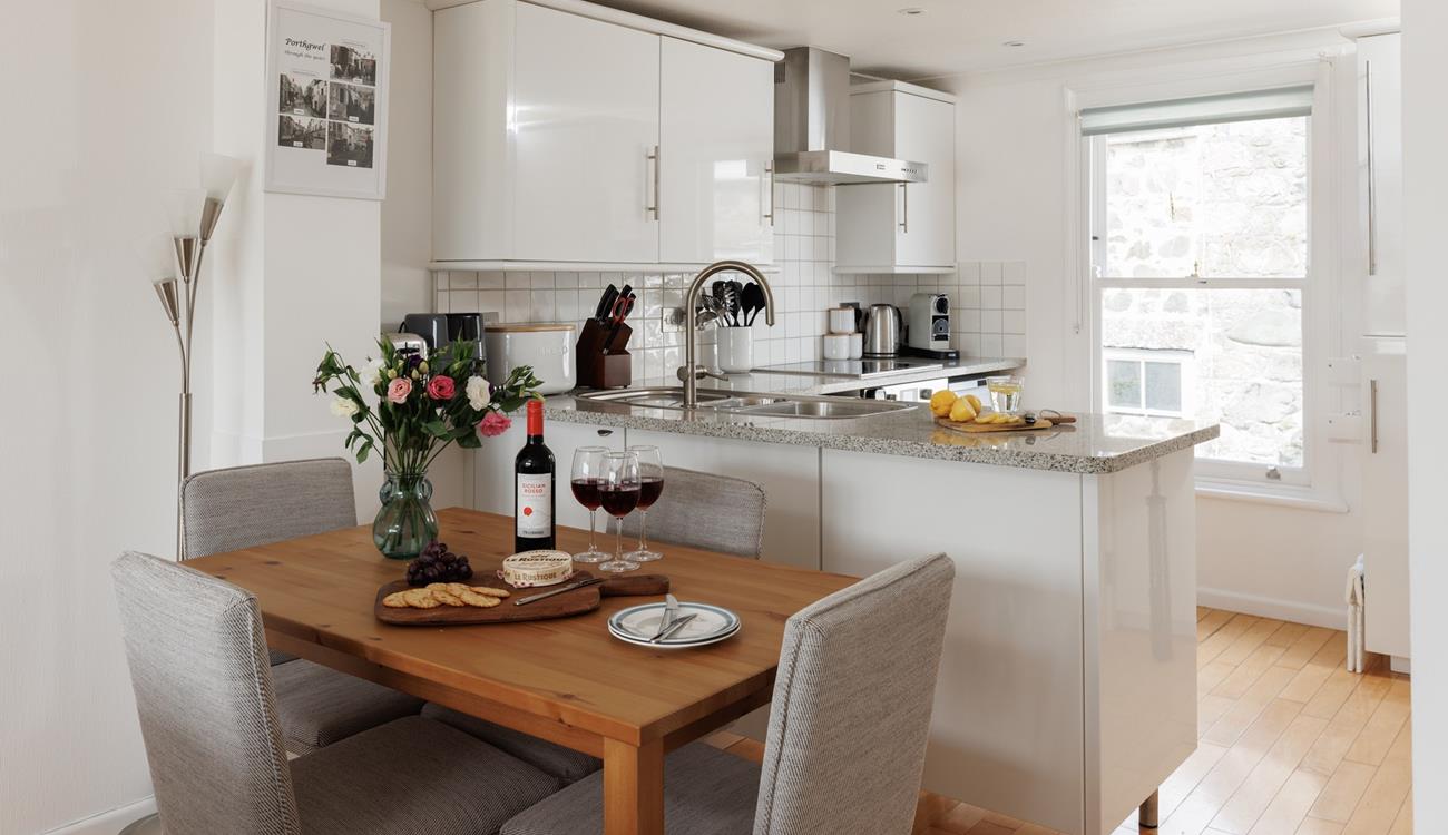 Enjoy a delicious meal around the dining table. 