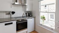 Cook up a storm in the well-equipped kitchen. 