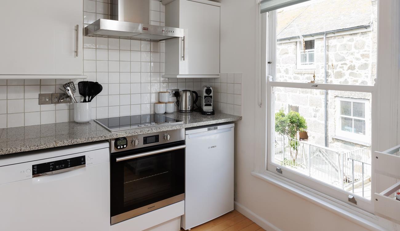 Cook up a storm in the well-equipped kitchen. 
