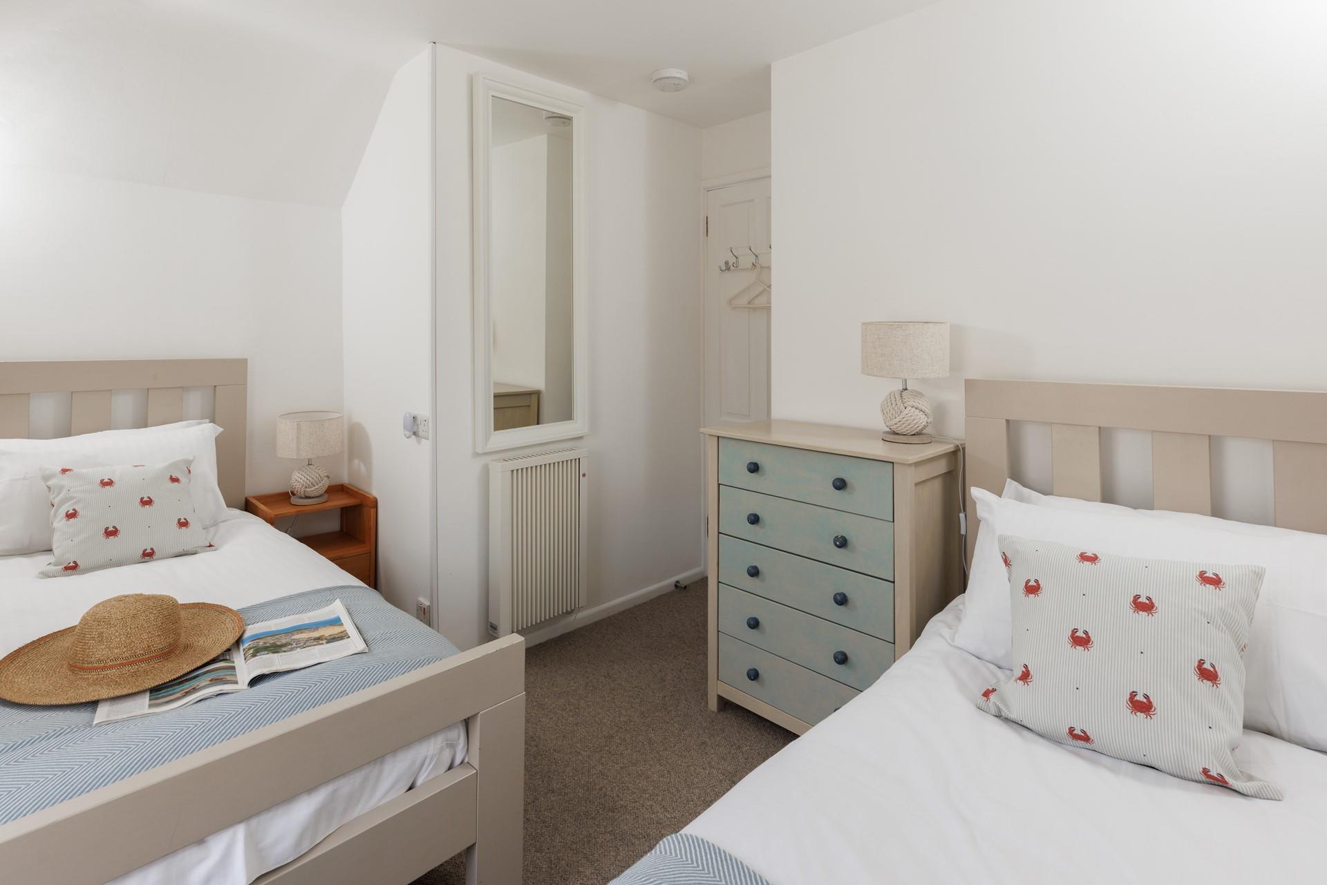 The twin beds are perfect for young adults or children.
