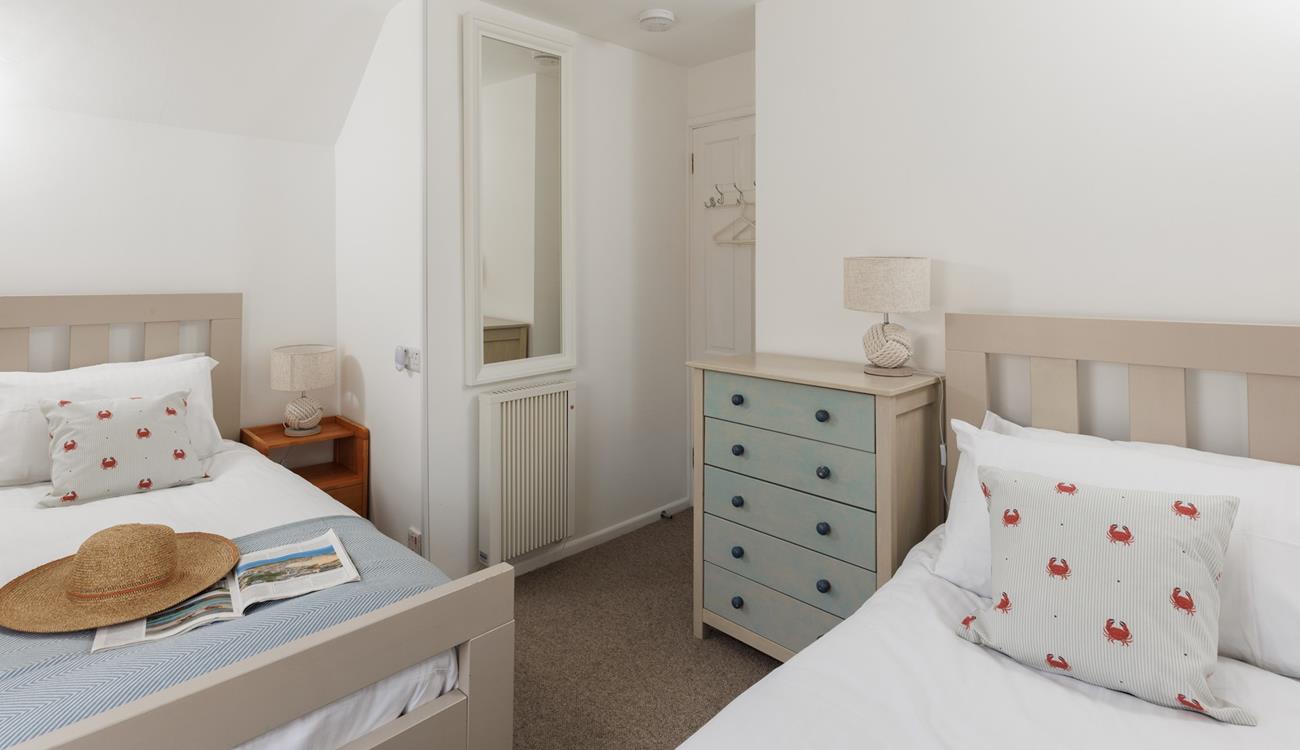 The twin beds are perfect for young adults or children.