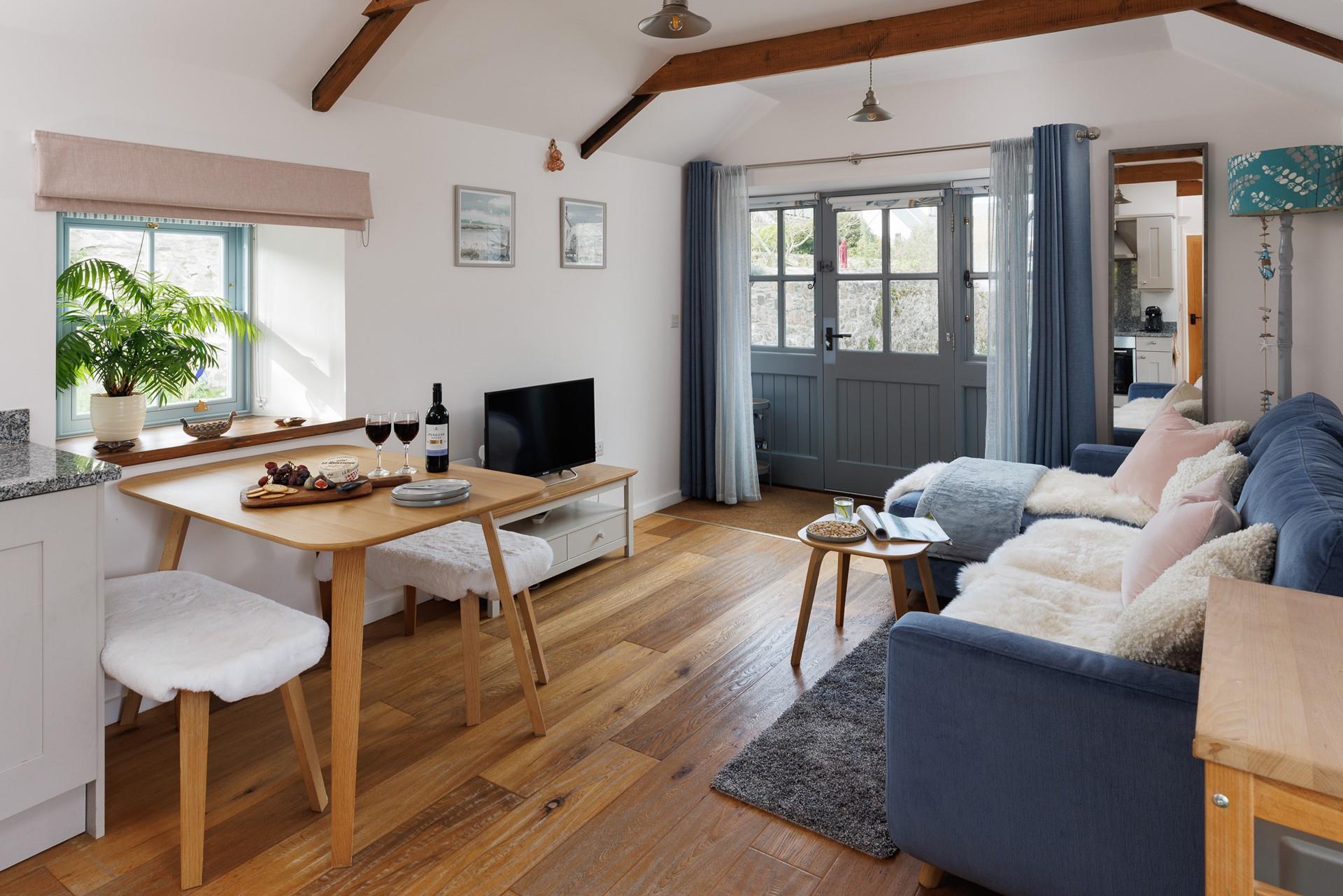 The beautifully decorated living area offers peace and tranquility for a couple. 