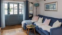 Snuggle up on the sofa and relax after a day filled with adventure. 