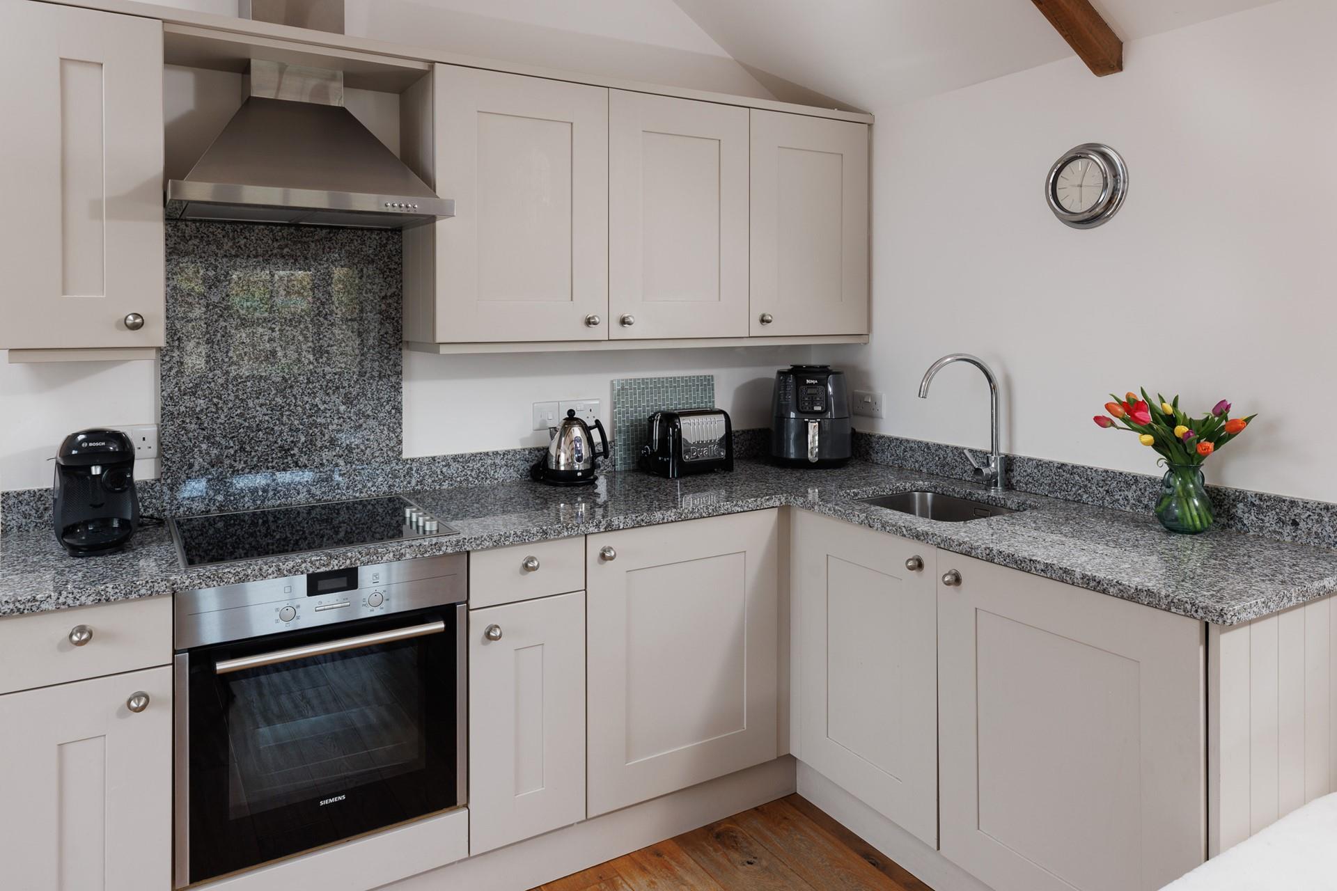 The kitchen is well-equipped for rustling up a delicious meal. 