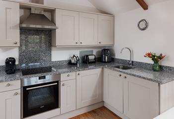 The kitchen is well-equipped for rustling up a delicious meal. 