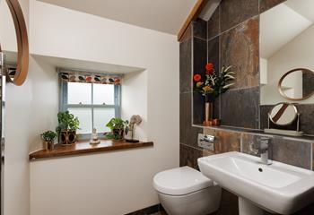 The modern shower room is the perfect place to get ready to start the day. 