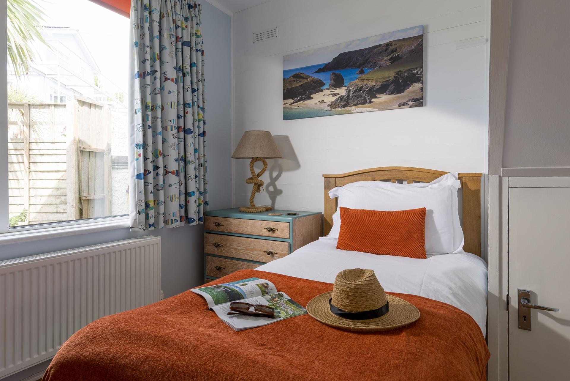 Bedroom 2 is suitable for an adult or child.