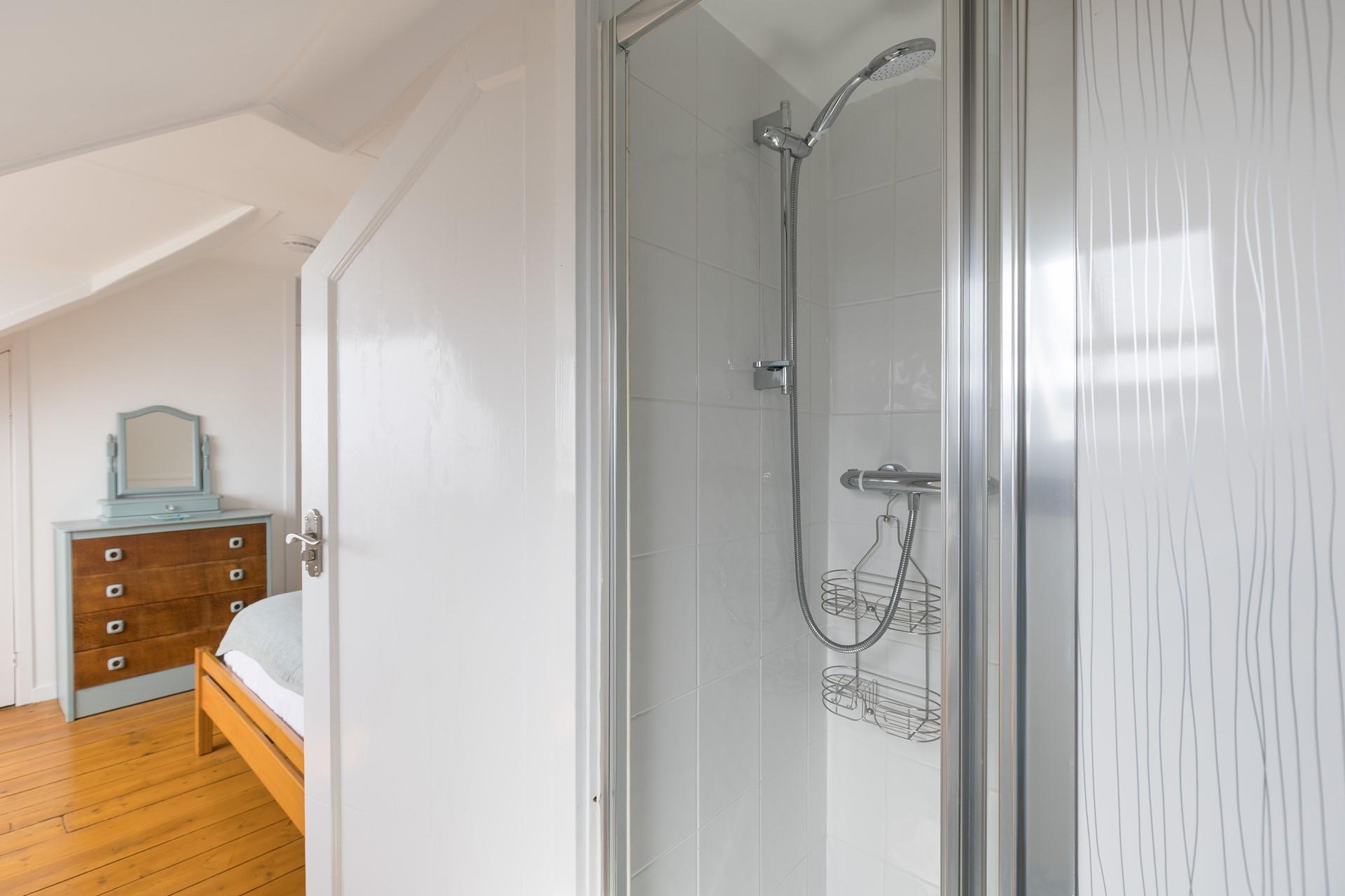 Bedroom 3 has a handy shower enclosure. 