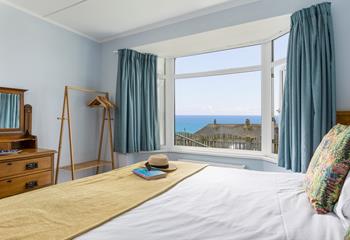 Open the windows in bedroom 1 and let the sea air in!