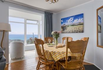 Spend leisurely mealtimes around the dining table, taking in the view.