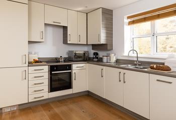 The kitchen is well-equipped with everything you need.