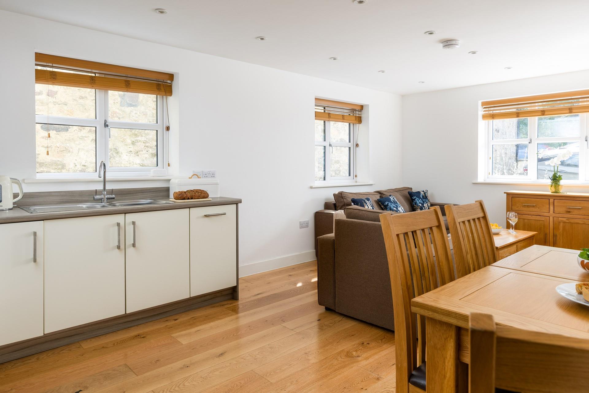 The open plan living area has all you need to relax together!